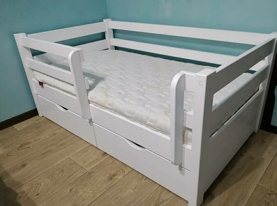 Кровать односпальная тахта RainbowDream Маркус 80х190 см белый массив ольхи, с ящиками и бортиком
Кровать односпальная тахта RainbowDream Маркус 80х190 см белый массив ольхи, с ящиками и бортиком