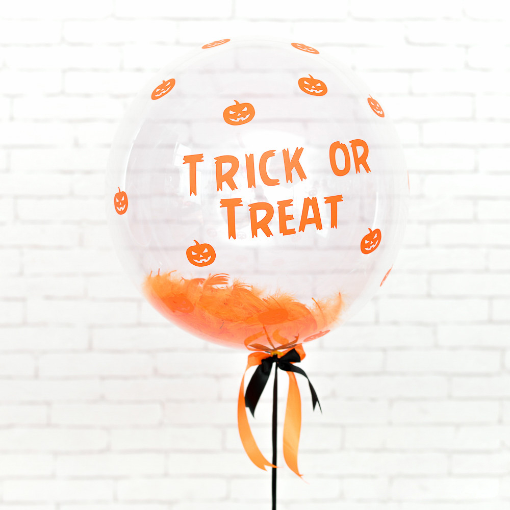 Композиция: Шар с гелием Bubble с оранжевой надписью Trick or Treat, оранжевыми перьями на черной атласное
Композиция: Шар с гелием Bubble с оранжевой надписью Trick or Treat, оранжевыми перьями на черной атласное