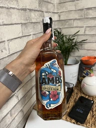Спиртный напиток на основе рома Lamb's Spiced 1 л 30% (0048415540964N) фото от покупателей 7
