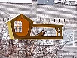 Кормушка для птиц на окно House_for_birds "Домик желтый" фото от покупателей 4