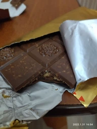 Молочный шоколад Ferrero Rocher с лесными орехами 90 г фото от покупателей 1