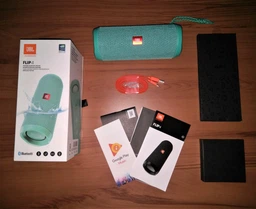 Акустическая система JBL Flip 4 Black (JBLFLIP4BLK) фото от покупателей 18