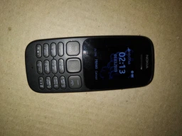 Мобільний телефон NOKIA 105 BLACK фото від покупців 11
