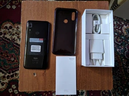 Мобильный телефон Xiaomi Redmi 7 3/32GB Eclipse Black (Международная версия) фото от покупателей 9