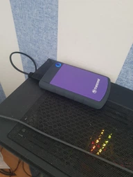 Внешний жесткий диск 2Tb Transcend StoreJet 25H3, Purple (TS2TSJ25H3P) фото от покупателей 10