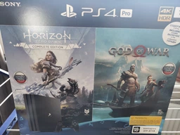 Ігрова приставка PlayStation 4 Pro 1TB Black у комплекті з 2 іграми (God Of War + Horizon Zero Dawn) фото від покупців 14
