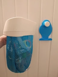 Контейнер для іграшок Munchkin Bath Toy Scoop (012399) (5019090123990) фото від покупців 5