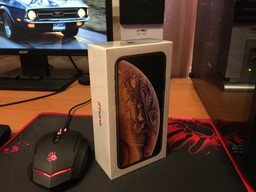 Мобильный телефон Apple iPhone Xs 64GB Gold (MT9G2) Официальная гарантия фото от покупателей 18