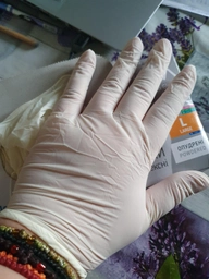 Одноразові рукавиці MedTouch латексні з пудрою Розмір L 100 шт. Білі (4820226660118/Н325900) фото від покупців 7
