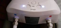 Водонагреватель Проточный Zanussi 3-logic 3,5 TS (душ+кран) фото от покупателей 4