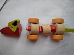 Деревянная игрушка каталка Cubika Такса (13623) фото от покупателей 6
