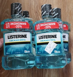 Ополаскиватель для ротовой полости Listerine Cool Mint Свежая мята 600 мл (3574661287539/3574661566597) фото от покупателей 15