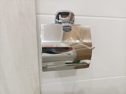 Тримач туалетного паперу з кришкою Perfect Sanitary Appliances RM 1601 латунь, настінний, хром
