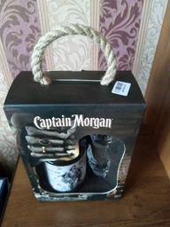 Ромовий напій Captain Morgan Spiced Black 0.7 л 40% + 2 чарки (4820178650533) фото від покупців 2