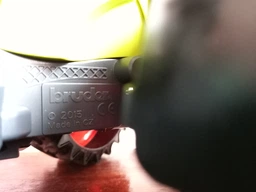 Спецтехника Bruder трактор Claas Axion 950 с погрузчиком (03013)