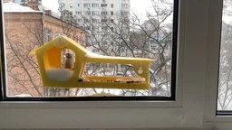 Кормушка для птиц на окно House_for_birds "Домик желтый" фото от покупателей 8