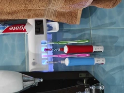 Автоматичний УФ-стерилізатор диспенсер для зубної пасти та щітки Toothbrush sterilizer (as-1173) фото від покупців 1