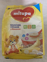 Каша Milupa молочна гречана з бананом для дітей від 6 місяців 210 г (5900852054778) фото від покупців 1