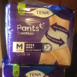 Трусы-подгузники для взрослых Tena Pants Plus Night ночные размер Medium 12 шт (7310361167124) фото от покупателей 14