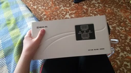 Стабілізатор напруги Real-El Stab Slim-1000 White (EL122400007)