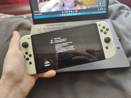 Набір портативна ігрова приставка Nintendo Switch OLED with White Joy-Con + Гра The Legend of Zelda: Breath of the Wild (картридж, російська версія) фото від покупців 2