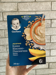 Дитяча каша Gerber Суха молочна швидкорозчинна Вівсяно-пшенична Банан-Манго для дітей з 6 місяців 240 г (7613039834053) фото від покупців 5