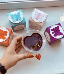 Подарунковий набір чаю Lovare в пірамідках Impression tea box з фірмовою чашкою (4820198877231) фото від покупців 3