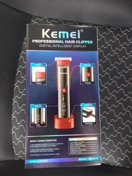 Професійна стрижкова машинка Kemei Km-5016 фото від покупців 2
