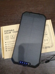 УМБ із сонячною панеллю VHG DN49 30000 mAh Wireless Solar Power Charger Orange фото від покупців 2