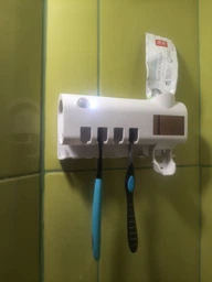Настінний диспенсер для зубної пасти і стерилізатор для щіток Toothbrush sterilizer WJ3 фото від покупців 11
