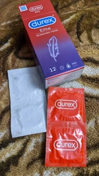 Презервативы латексные с силиконовой смазкой Durex Elite (тонкие) 12 шт (5010232954229) фото от покупателей 6