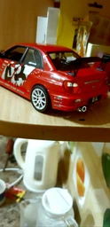 Машина Welly, Subaru Impreza Performance, метал., масштаб 1:24 (22487S-W)