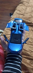 Машинка Tesla Model X колекційна моделька металева іграшка 15 см Фіолетовий (3532849) фото від покупців 1