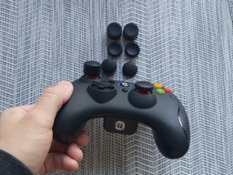Силиконовые накладки на аналоговые стики Game Teh X для джойстика PS4 черный 8 шт фото от покупателей 1