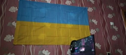 Флаг Украины большого размера 140*90 см (холст), яркий, насыщенный цвет с местом для держателя-флагштока фото от покупателей 5