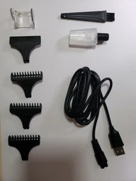 Тример для стрижки волосся та бороди VGR V-085 USB 1500 mAh золотистий фото від покупців 4