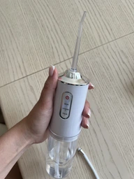 Акумуляторний іригатор для ротової порожнини USB 4 насадки фото від покупців 18