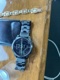 Титановий годинник з сонячною батареєю Garmin Fenix 7 Sapphire Solar DLC (010-02540-39) темно-сірий з титановим ремінцем