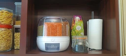 Обертовий контейнер для круп та бобових. Диспенсер для сипучих продуктів фото від покупців 6