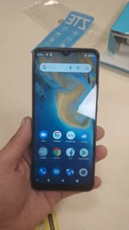 Мобільний телефон ZTE Blade A51 2/32 GB Gray (850640) фото від покупців 1