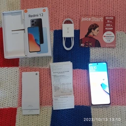 Мобільний телефон Xiaomi Redmi 12 4/128GB Sky Blue (993282) фото від покупців 10