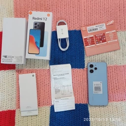 Мобільний телефон Xiaomi Redmi 12 4/128GB Sky Blue (993282) фото від покупців 9