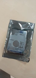 Жесткий диск Western Digital 2.5 Blue 2Tb (WD20SPZX) фото от покупателей 8