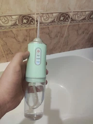 Портативный ирригатор для зубов и полости рта 230 мл Portable Oral Irrigator фото от покупателей 1