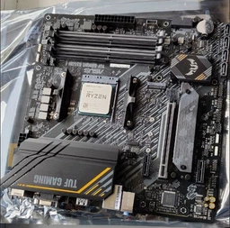 Материнська плата Asus TUF Gaming B550M-E (sAM4, AMD B550, PCI-Ex16) фото від покупців 2