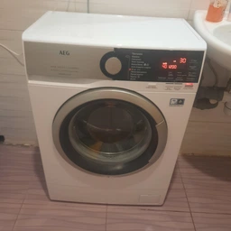 Стиральная машина узкая AEG L6SE26SUE фото от покупателей 1