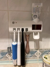 Настінний диспенсер для зубної пасти і стерилізатор для щіток Toothbrush sterilizer WJ3 фото від покупців 5