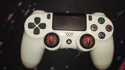 Силіконові накладки на стіки Spider-Man для Sony DualShock PS4 / DualSense PS5 (Чорні, 2шт.) [376412091] фото від покупців 11