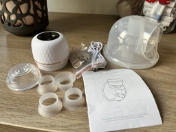 Електричний молоковідсмоктувач Wearable Breast Pump портативний бездротовий молоковідсмоктувач з функцією масажу та стимуляцією лактації білий фото від покупців 9