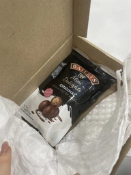 Шоколадные конфеты драже с начинкой Irish cream Baileys 102 гр фото от покупателей 2